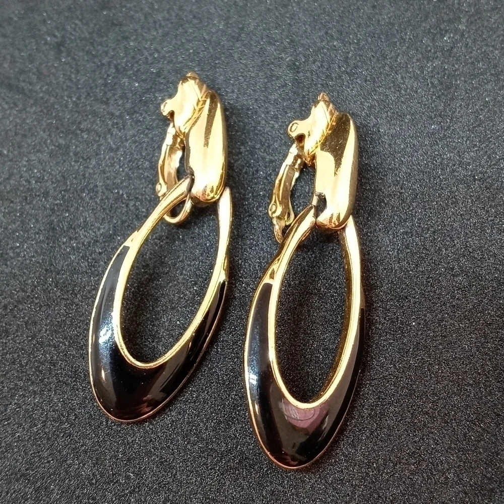 Trifari costume jewelry gold and black accent clip on earrings